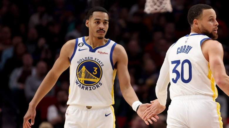Jordan Poole and Stephen Curry of the Golden State Warriors.