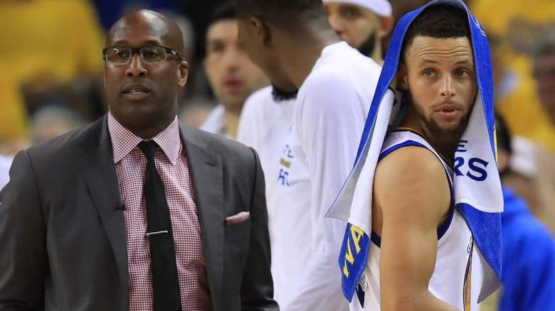 Golden State Warriors star Stephen Curry and Sacramento Kings head coach Mike Brown.