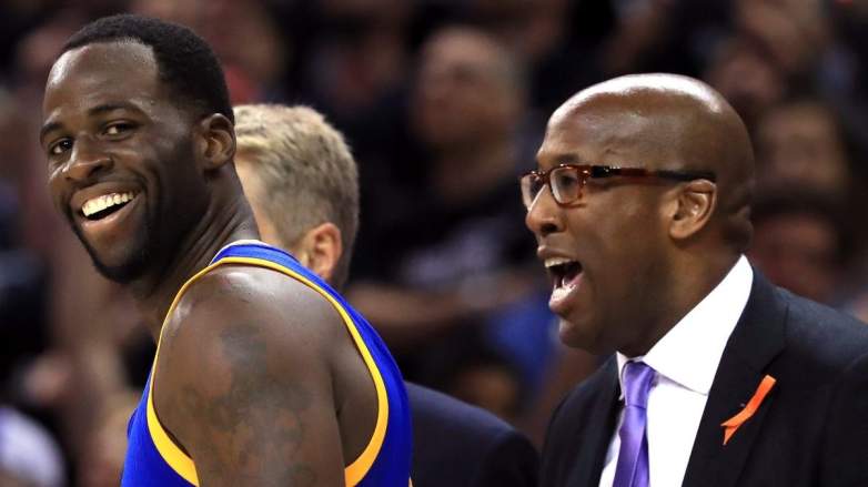 Golden State Warriors forward Draymond Green and Sacramento Kings coach Mike Brown.