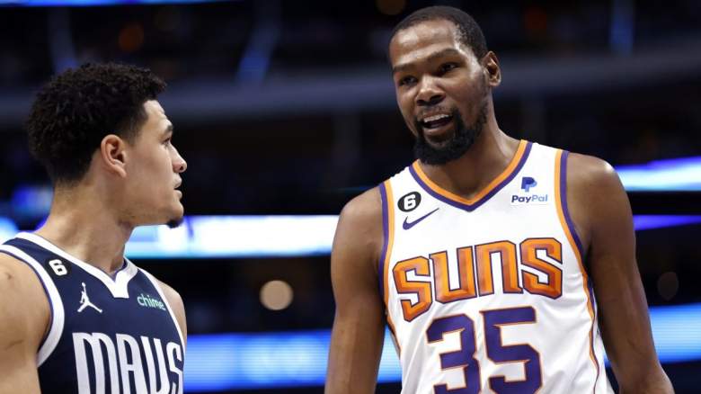 Kevin Durant of the Phoenix Suns and Dallas Mavericks forward Josh Green.