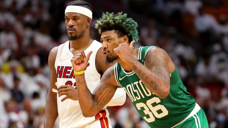 Marcus Smart (right) of the Celtics is ready for Heat star Jimmy Butler.