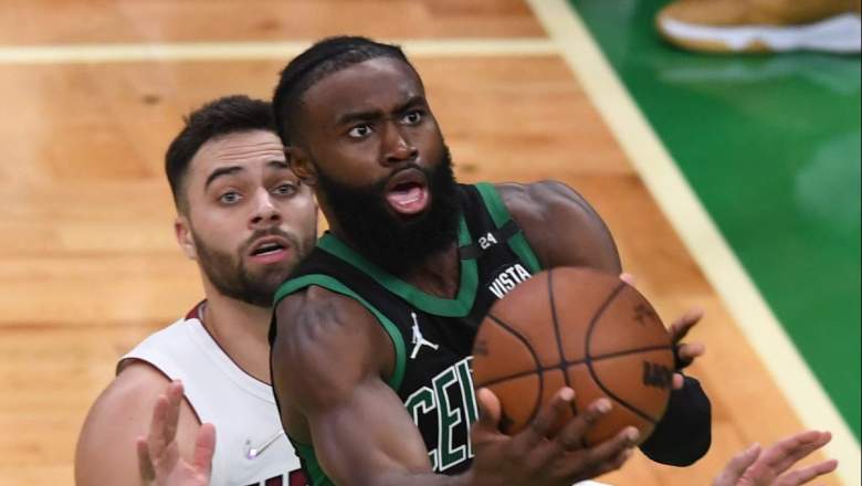 Boston Celtics star Jaylen Brown is guarded by Miami Heat wing Max Strus.
