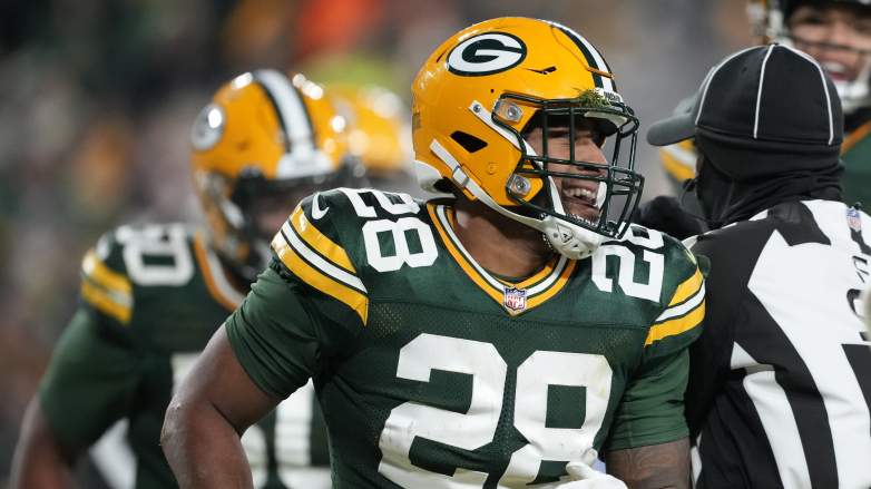 AJ Dillon of the Green Bay Packers warms up before the game against   Green bay packers, Green bay packers football, Green bay packers wallpaper