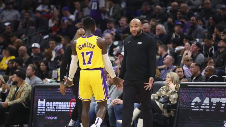 Lakers coach Darvin Ham talks to Dennis Schroder