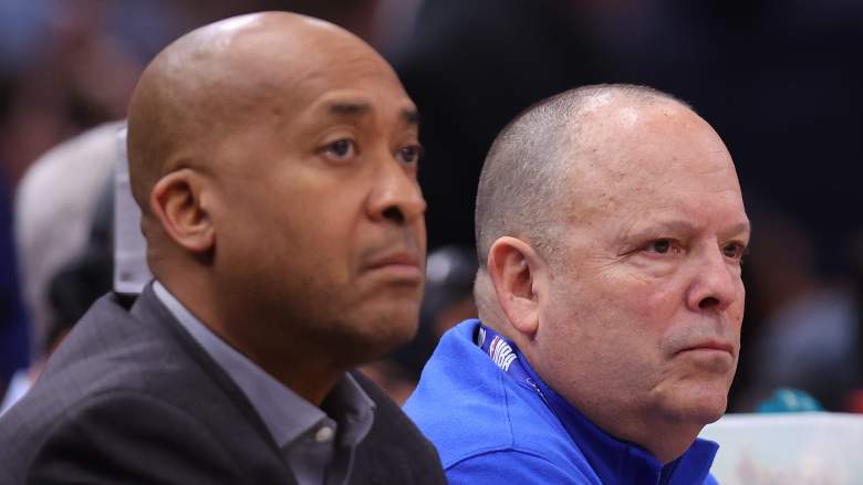 Knicks president Leon Rose and executive vice president William Wesley watch the game from the sideline during an NBA game.