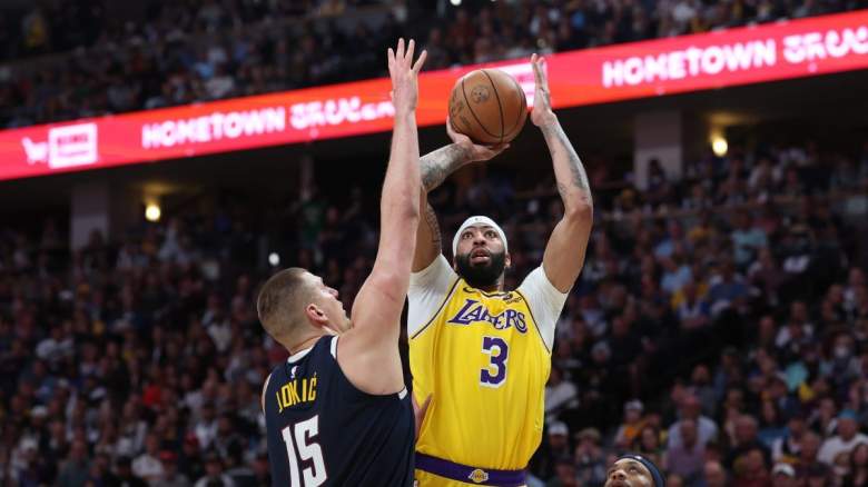 Lakers' Anthony Davis shoots over Nuggets' Nikola Jokic