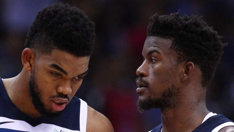 Minnesota Timberwolves star Karl Anthony-Towns and Jimmy Butler of the Miami Heat.