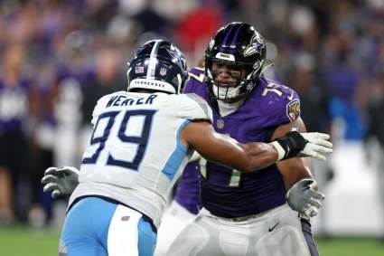 John Harbaugh Commends Massive Ravens Lineman Competing to be Starter