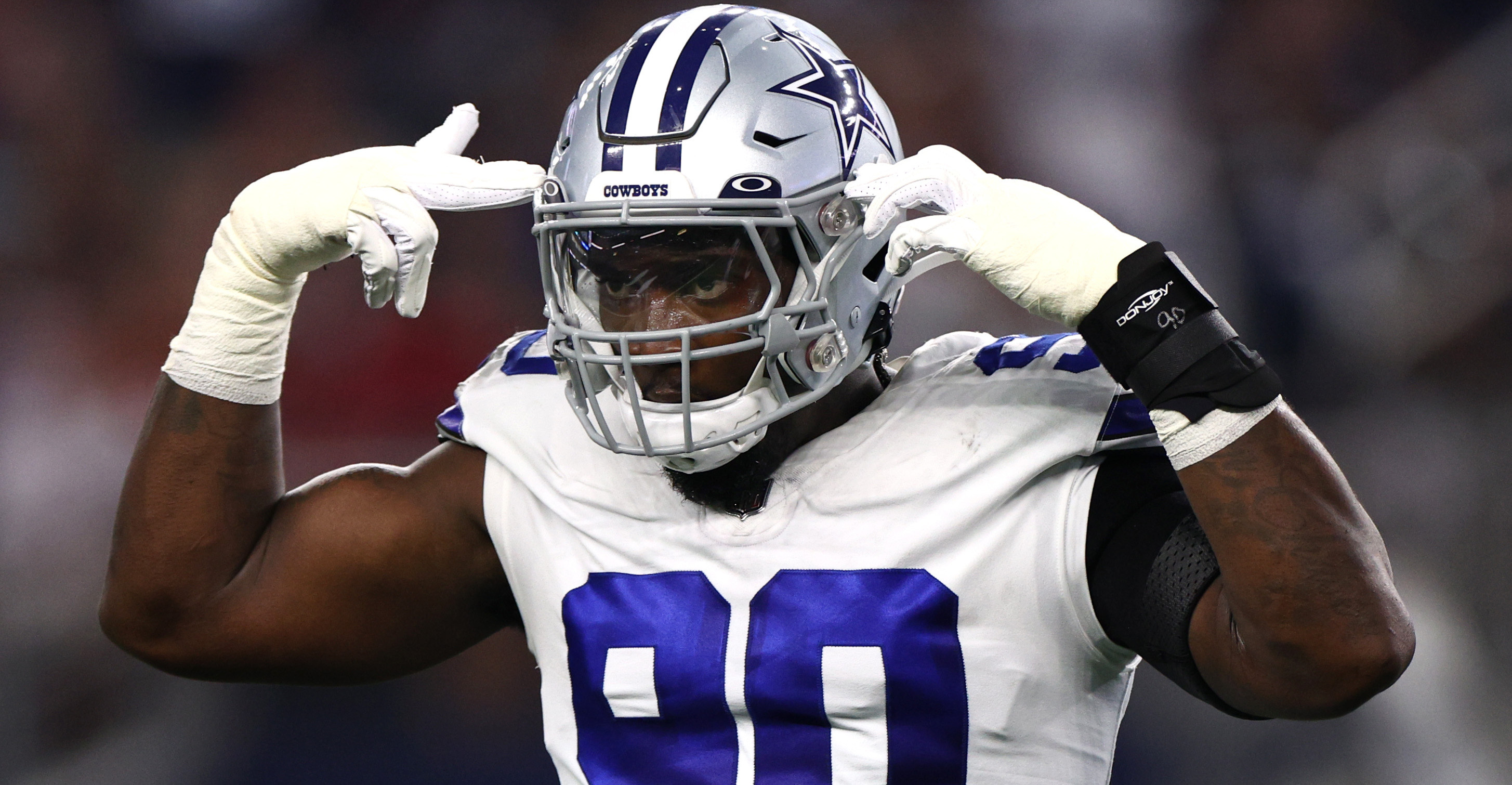 How much will the Dallas Cowboys pay DeMarcus Lawrence?