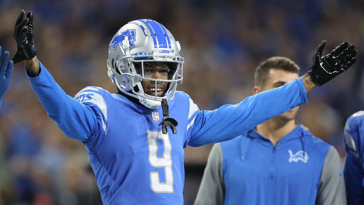 Packers fan caught by  TV cameras showering Lions star Amon-Ra St.  Brown with beer while he celebrated touchdown