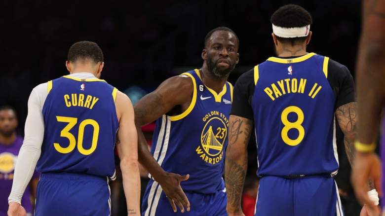 Stephen Curry, Draymond Green, and Gary Payton II of the Golden State Warriors.