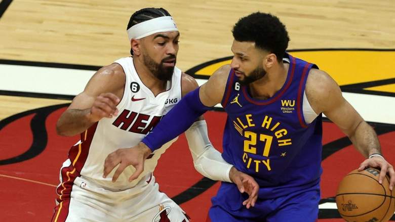 Miami Heat guard Gabe Vincent defends Jamal Murray of the Denver Nuggets.
