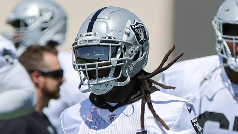 Las Vegas Raiders running back Brandon Bolden (34) takes a break