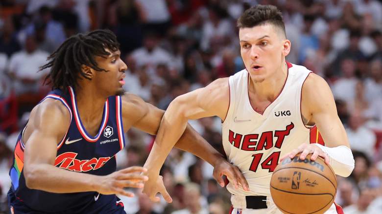 Sixers guard Tyrese Maxey (left) and Tyler Herro of the Miami Heat.