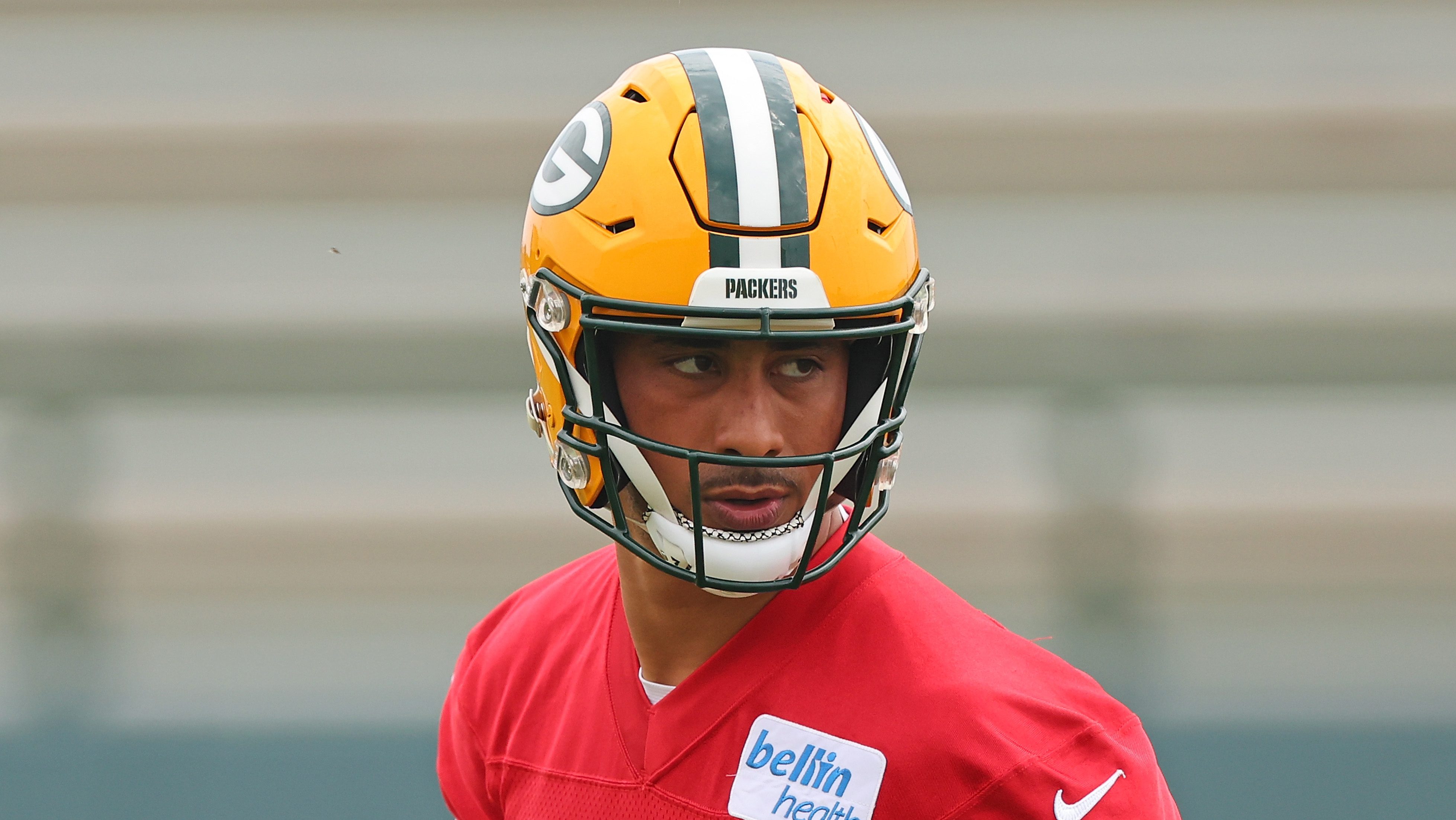 Jordan Love of the Green Bay Packers works out during training