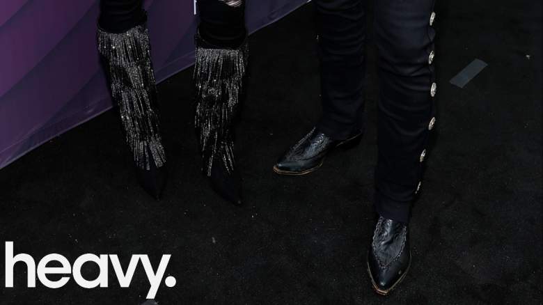 Boots on a red carpet.