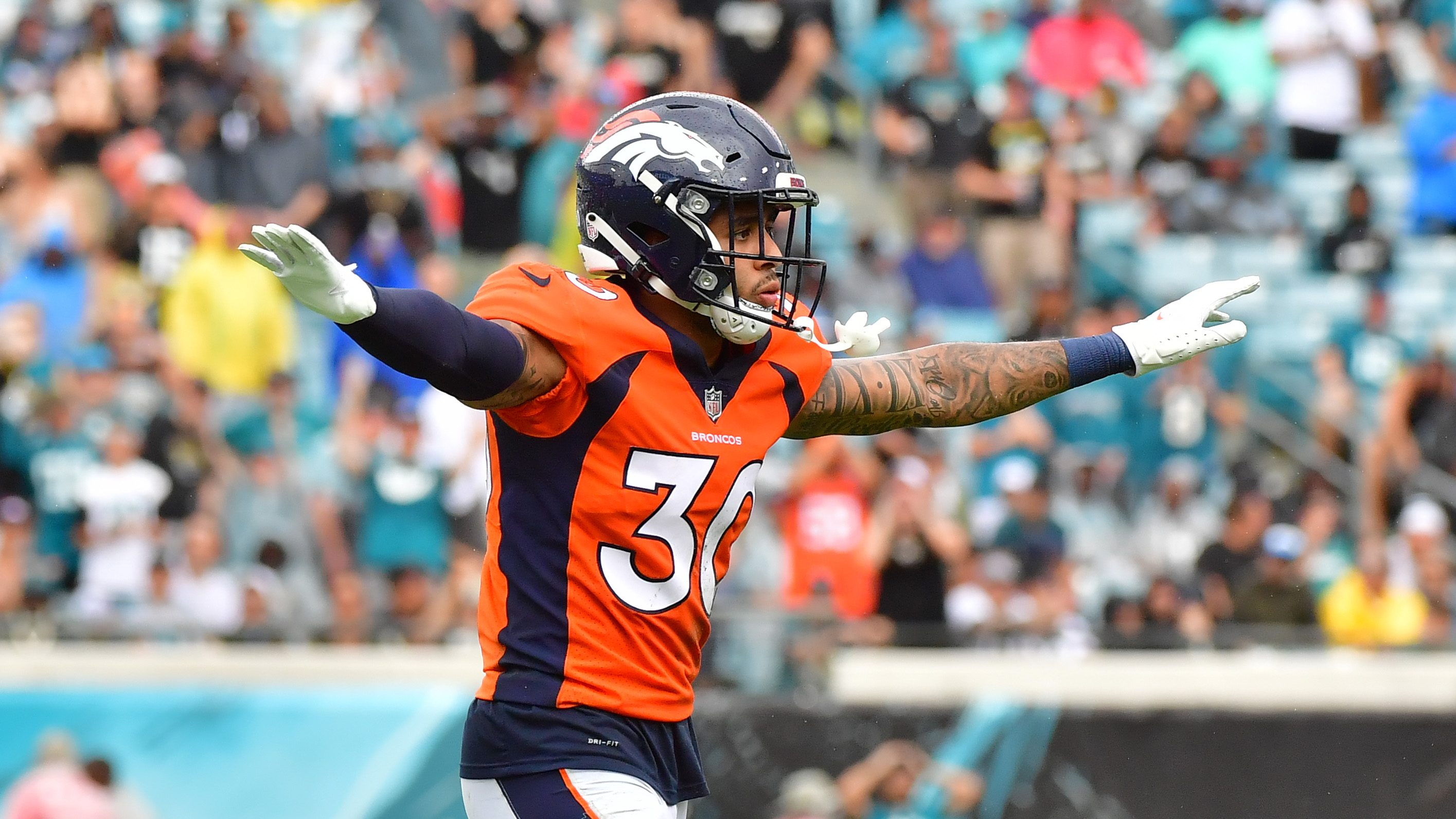 Safety Delarrin Turner-Yell of the Denver Broncos looks on after a