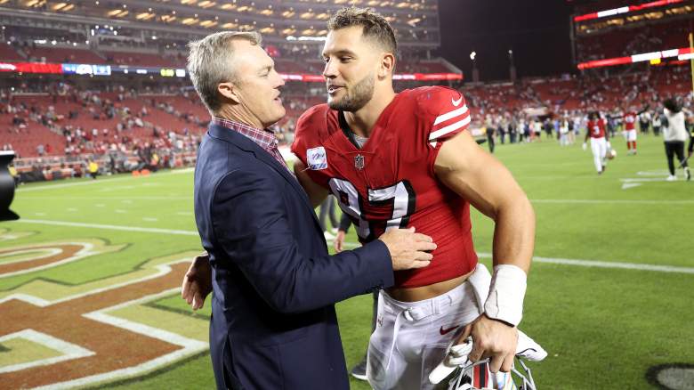 Nick Bosa (right) and GM John Lynch of the 49ers