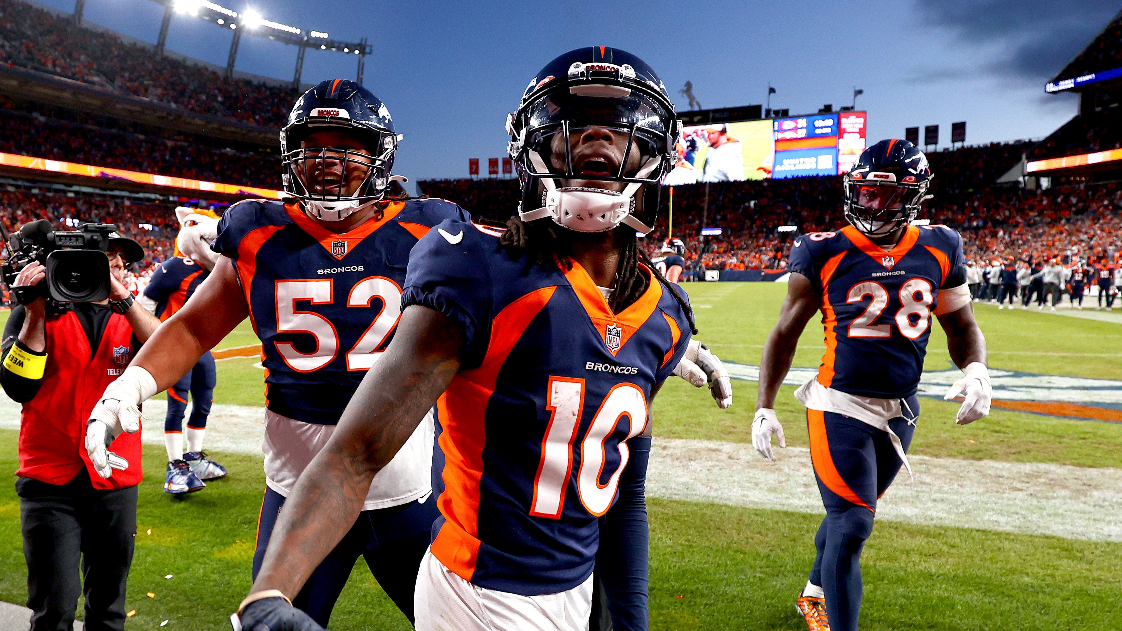 Jaleel McLaughlin and Russell Wilson of the Denver Broncos celebrate  News Photo - Getty Images