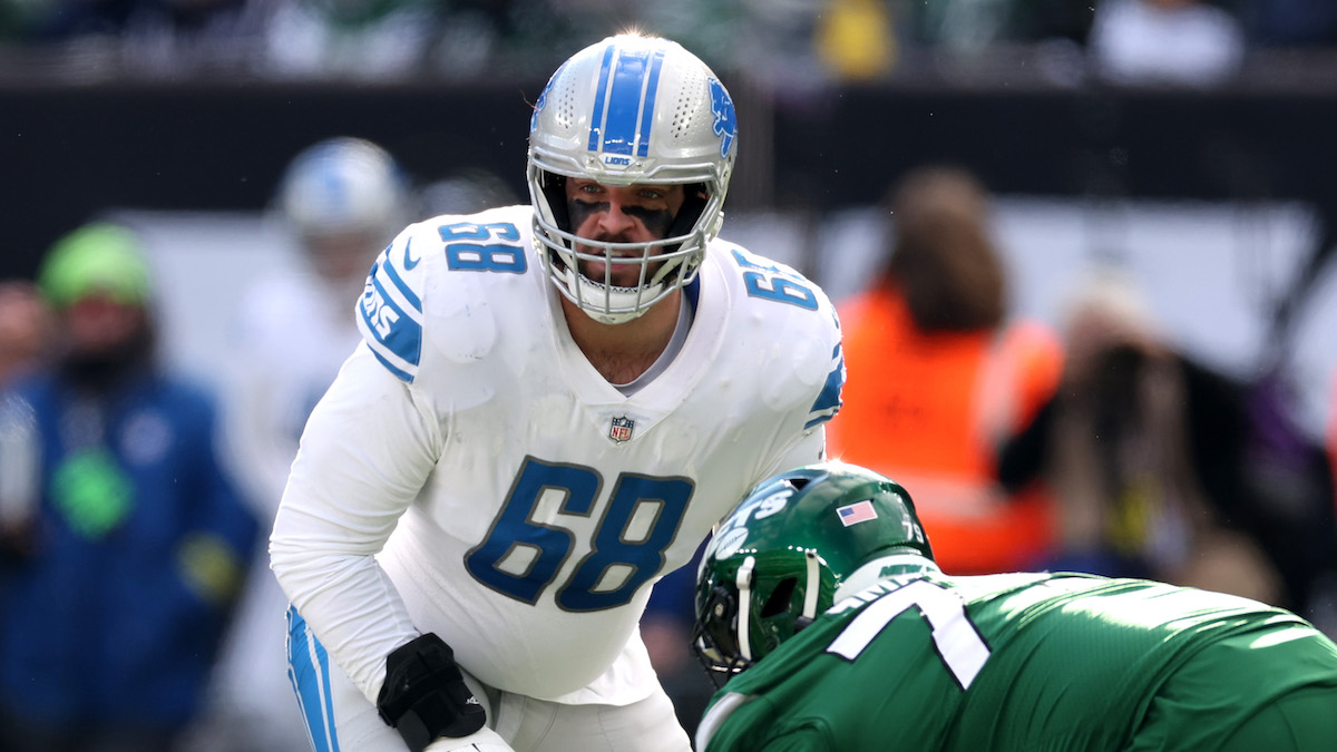 Detroit's St. Brown gets Lambeau Leap beer shower in Lions fans