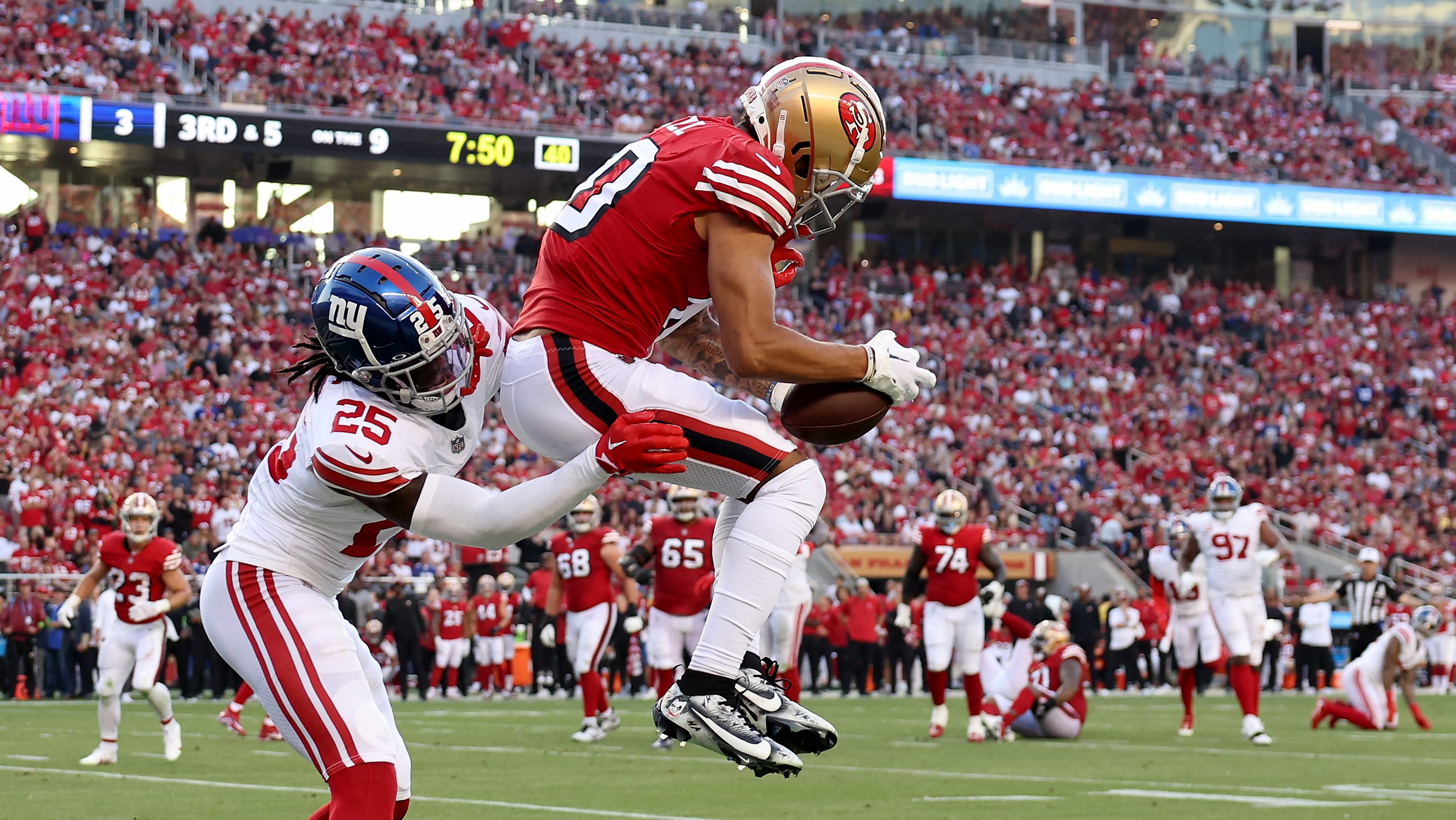 Ronnie Bell of the San Francisco 49ers runs with the ball of a News  Photo - Getty Images