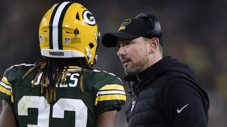 Packers coach Matt LaFleur (right) took criticism from the brother of Aaron Jones (left) in Sunday's loss to Minnesota.