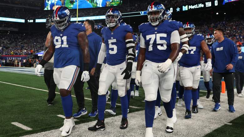 New York Giants guard Joshua Ezeudu looks to block against the New