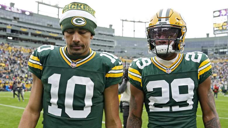 Jordan Love (left) and Rasul Douglas of the Packers