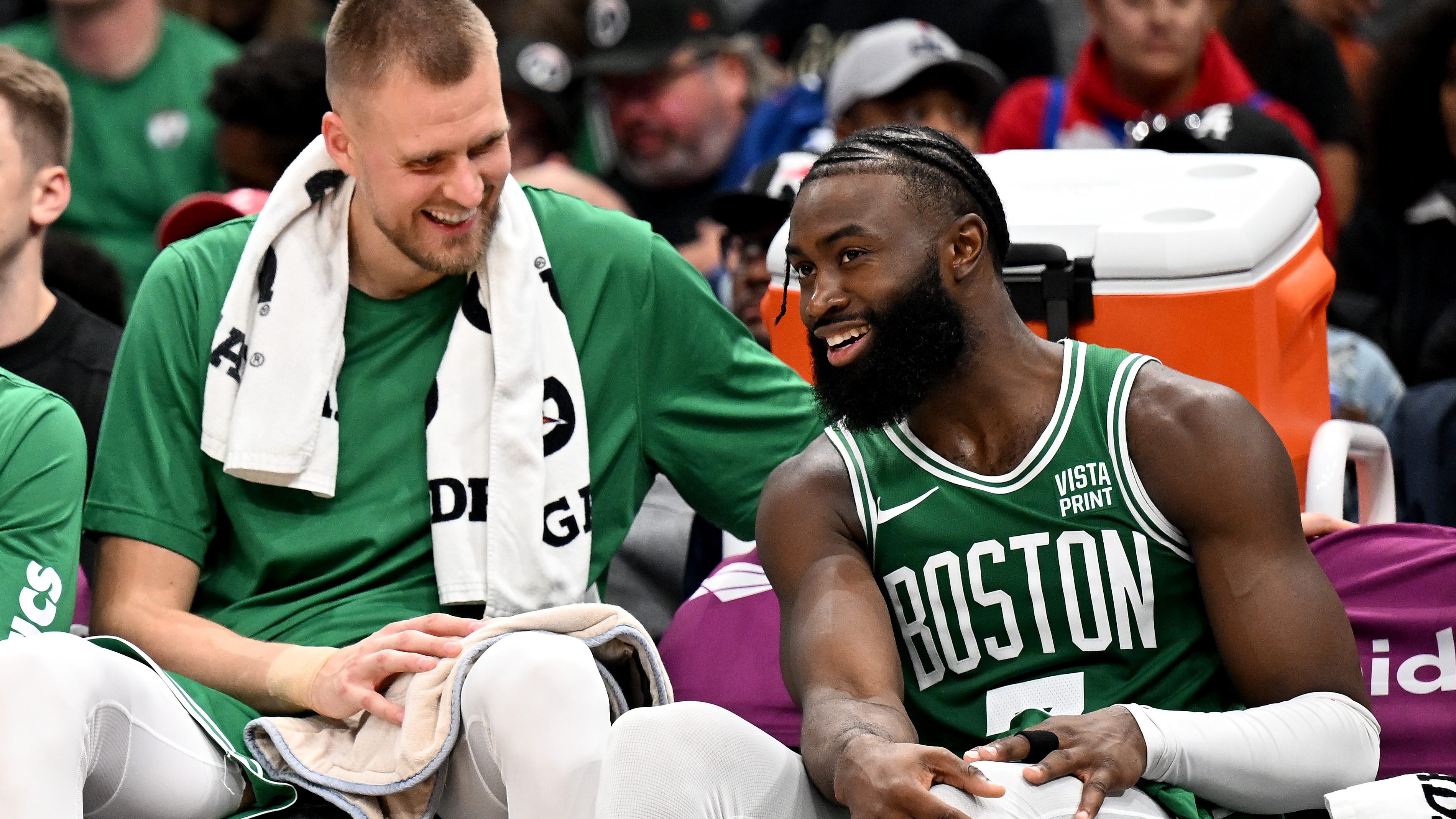 Boston Celtics stars Kristaps Porzingis (left) and Jaylen Brown.