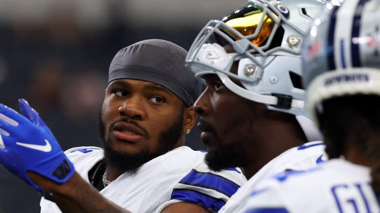 The Cowboys' Brandin Cooks (right) has come under fire for a lack of production.