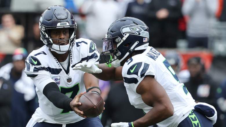 Seahawks QB Geno Smith and RB Kenneth Walker III, who both got troubling injury updates ahead of their Week 12 49ers matchup.