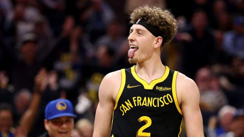 Brandin Podziemski #2 of the Golden State Warriors reacts after making a basket.