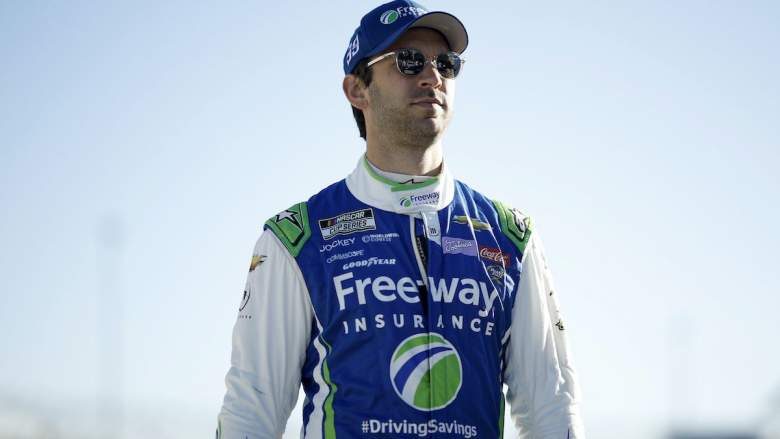 Daniel Suarez walks grid before practice.