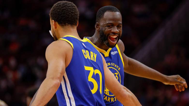 Draymond Green (right) and Steph Curry of the Warriors