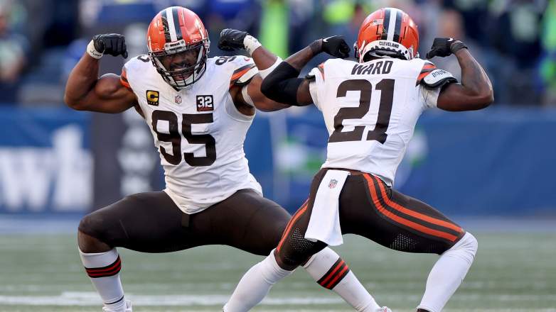 Myles Garrett of the Cleveland Browns celebrates his sack with Denzel Ward. Ward will not play on Sunday against the Rams.
