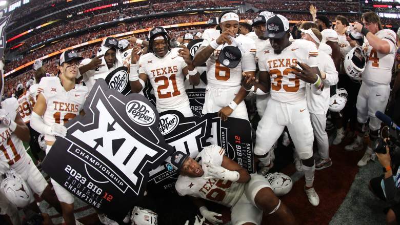 The Texas Longhorns celebrate after defeating the Oklahoma State Cowboys in the Big 12 Championship.
