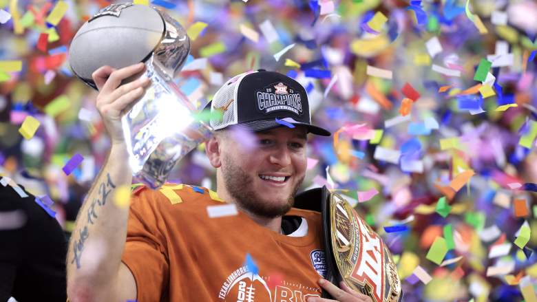 Quarterback Quinn Ewers of the Texas Longhorns celebrates after Texas defeated the Oklahoma State Cowboys in the Big 12 Championship. His family has played a big role in his life.