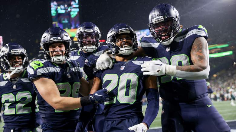 The Seahawks defense celebrates as their playoff chances increase ahead of Week 16 vs the Titans