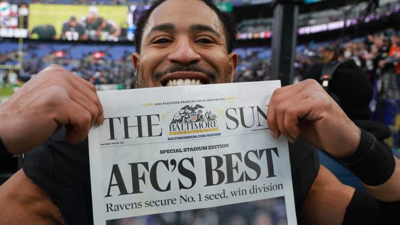 Ravens' Andrew Adams celebrates after Baltimore secured the No. 1 seed.