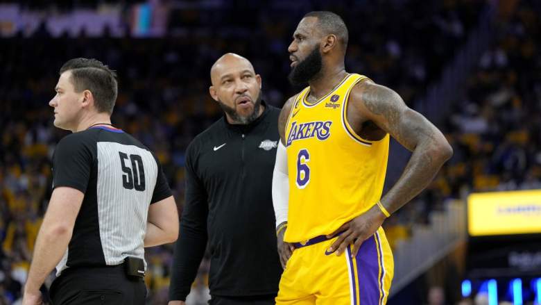 Lakers coach Darvin Ham talks to LeBron James