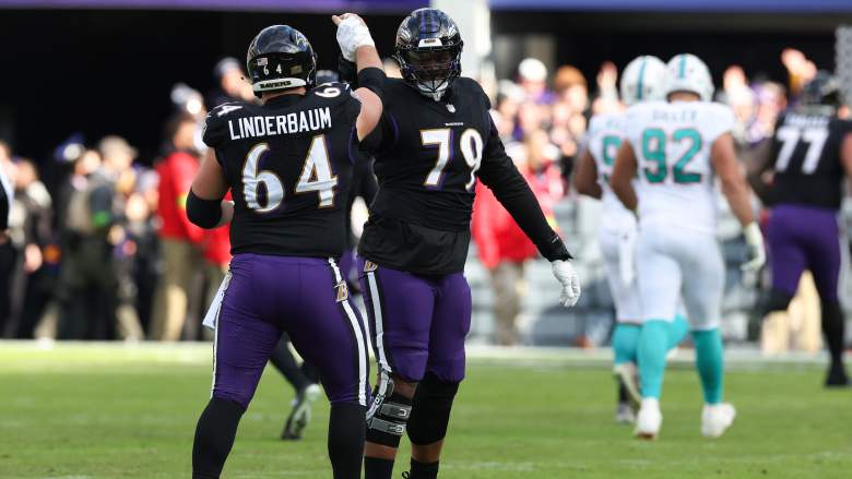 Ravens LT Ronnie Stanley celebrates with teammate Tyler Linderbaum during game with Dolphins.