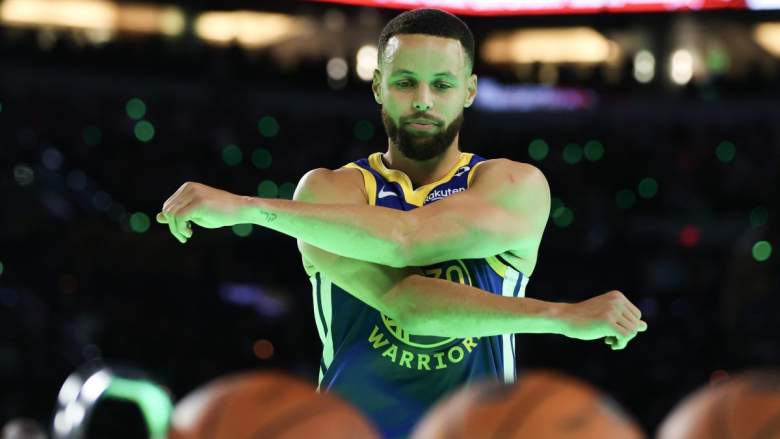 Warriors star Steph Curry warms up