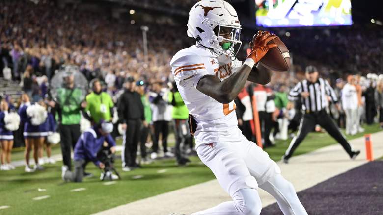 Wide receiver Xavier Worthy of the Texas Longhorns catches a touchdown pass against the Kansas State Wildcats.