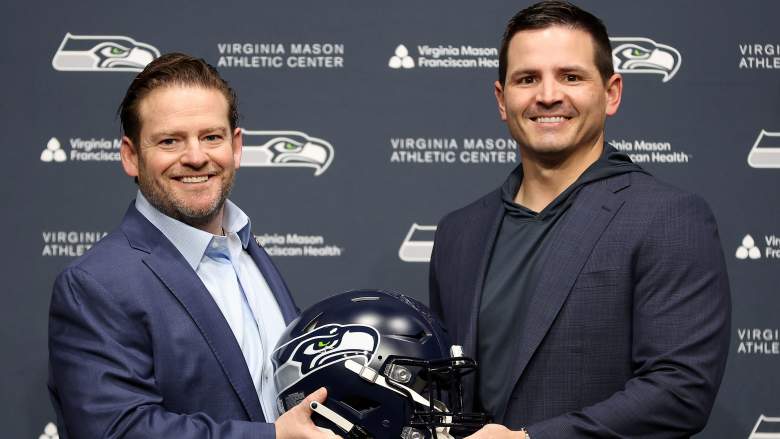 RENTON, WASHINGTON - FEBRUARY 01: John Schneider, general manager of the Seattle Seahawks, poses with Mike Macdonald as Macdonald is announced as the new Seattle Seahawks head coach at Virginia Mason Athletic Center on February 01, 2024 in Renton, Washington. (Photo by Steph Chambers/Getty Images)