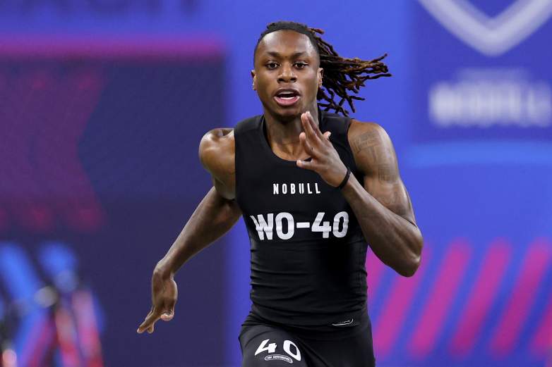 Xavier Worthy of Texas participates in the 40-yard dash during the NFL Combine.