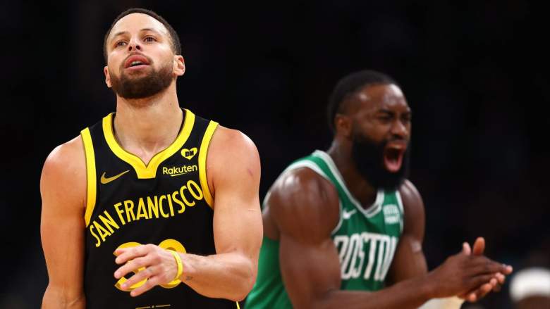Warriors star Steph Curry reacts as Jaylen Brown celebrates