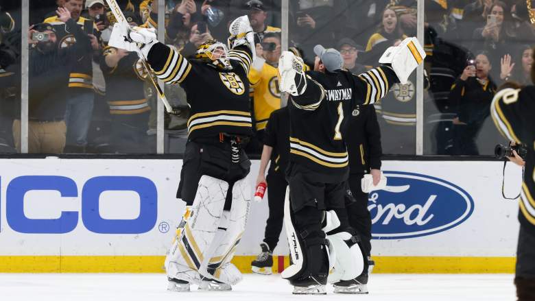 Linus Ullmark and Jeremy Swayman of the Boston Bruins celebrate a 6-2 win against the Ottawa Senators.