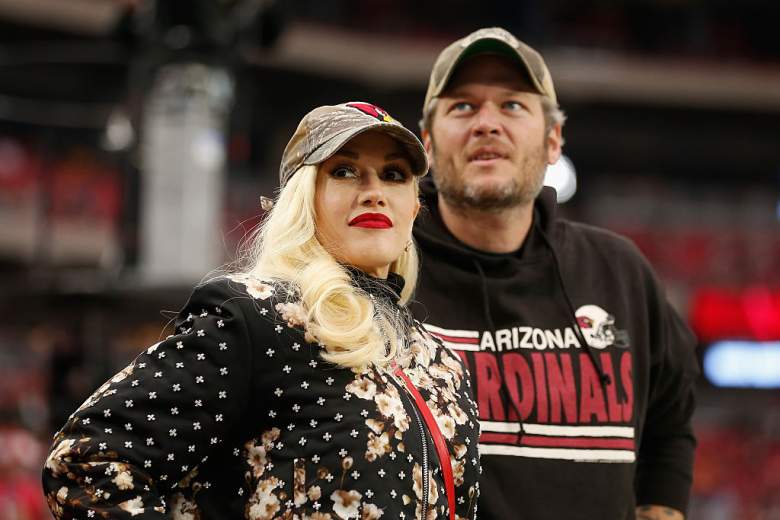 Gwen Stefani and Blake Shelton at a football game. 