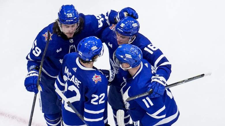Toronto Maple Leafs players celebrate a goal