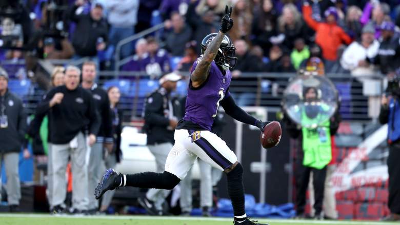 Ravens WR Odell Beckham celebrates while scoring a touchdown against the Browns.